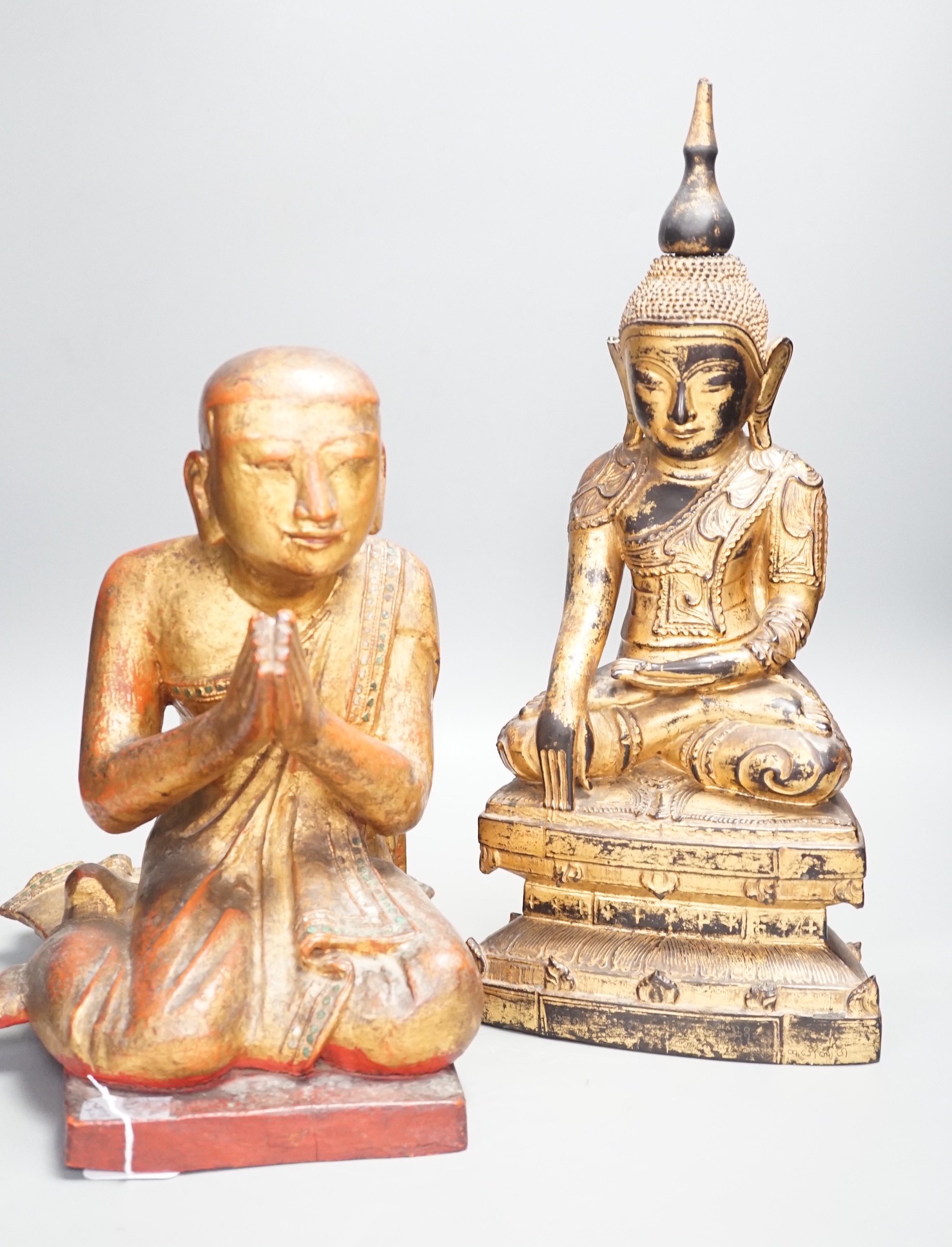 Two Thai gilt wood figures of Buddha, tallest 41cms high